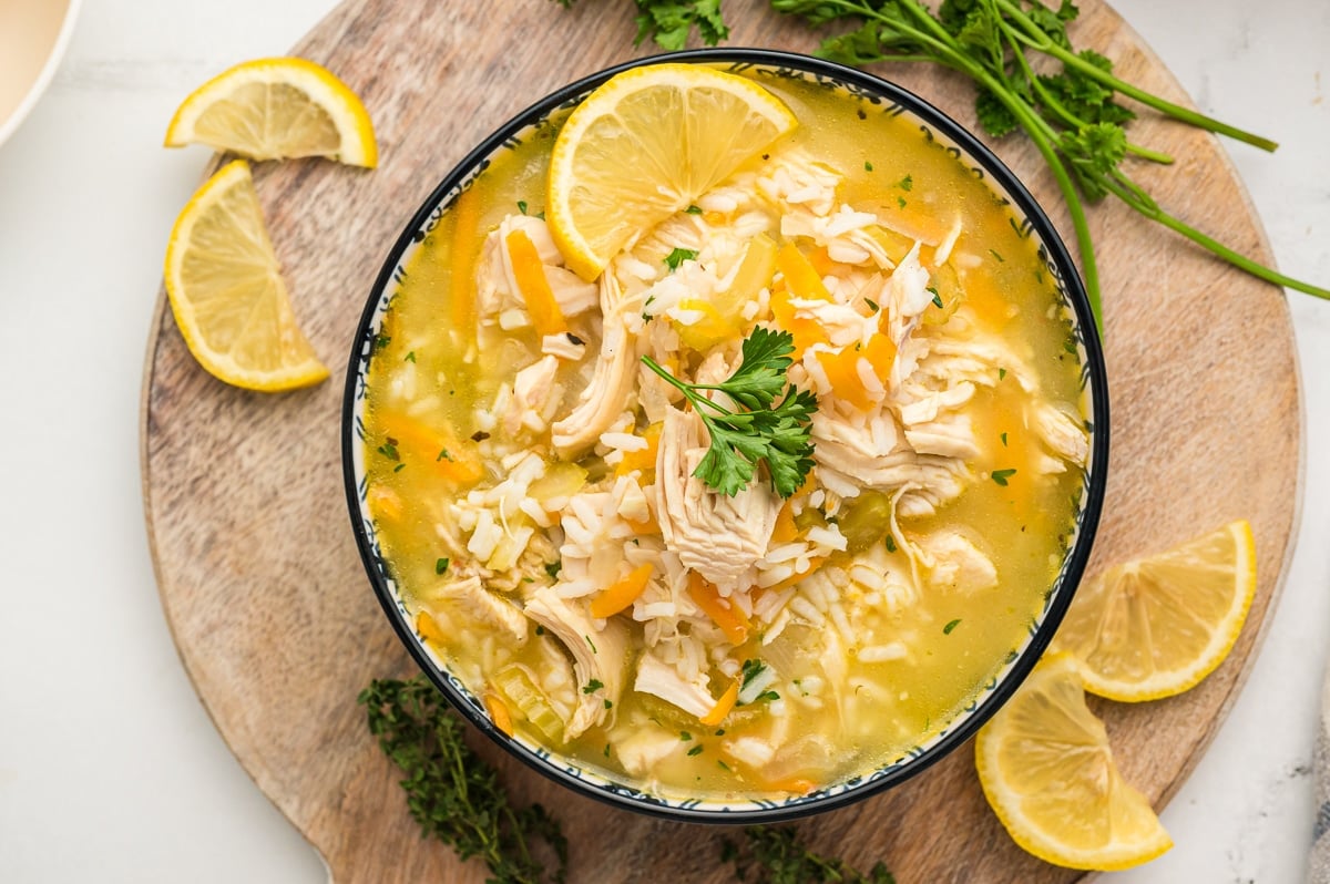 oveheard shot of lemon chicken and rice soup in a bowl.