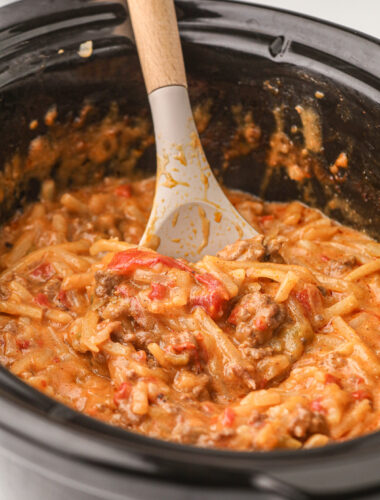 Taco potato casserole with spoon in it.