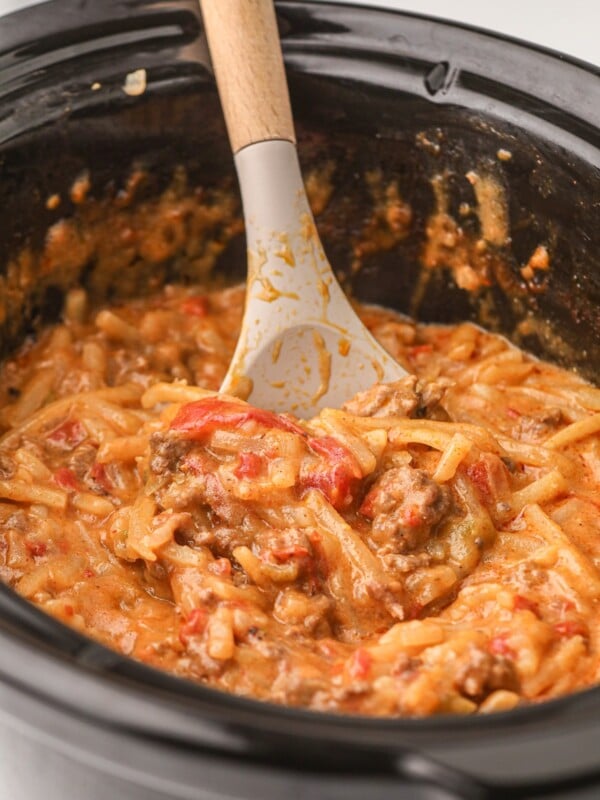 Taco potato casserole with spoon in it.