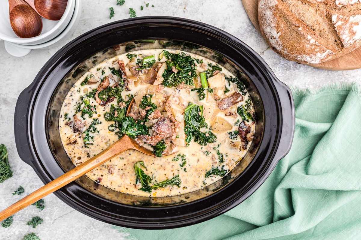Cooked zuppa toscana in crockpot.