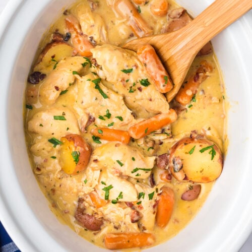 Creamy ranch chicken and potatoes in a crockpot.