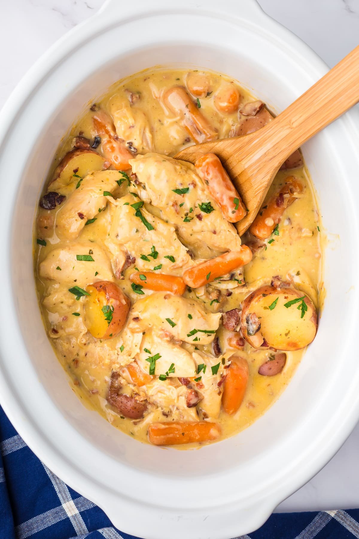 Creamy ranch chicken and potatoes in a crockpot.