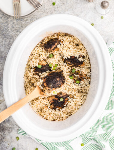 Chicken and basil with rice in a crockpot.