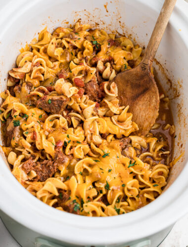 Cooked beef noodle casserole in a crockpot.