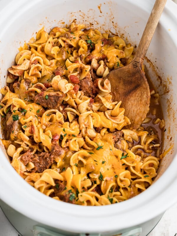 Cooked beef noodle casserole in a crockpot.