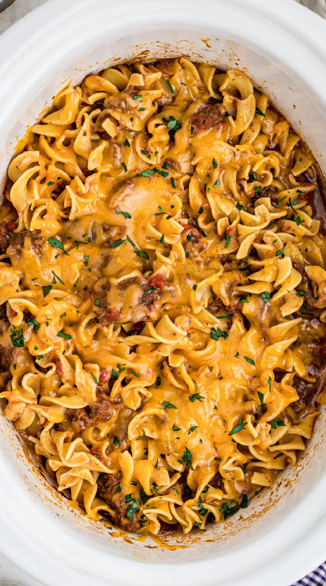 Long image of beef noodle casserole for pinterest.