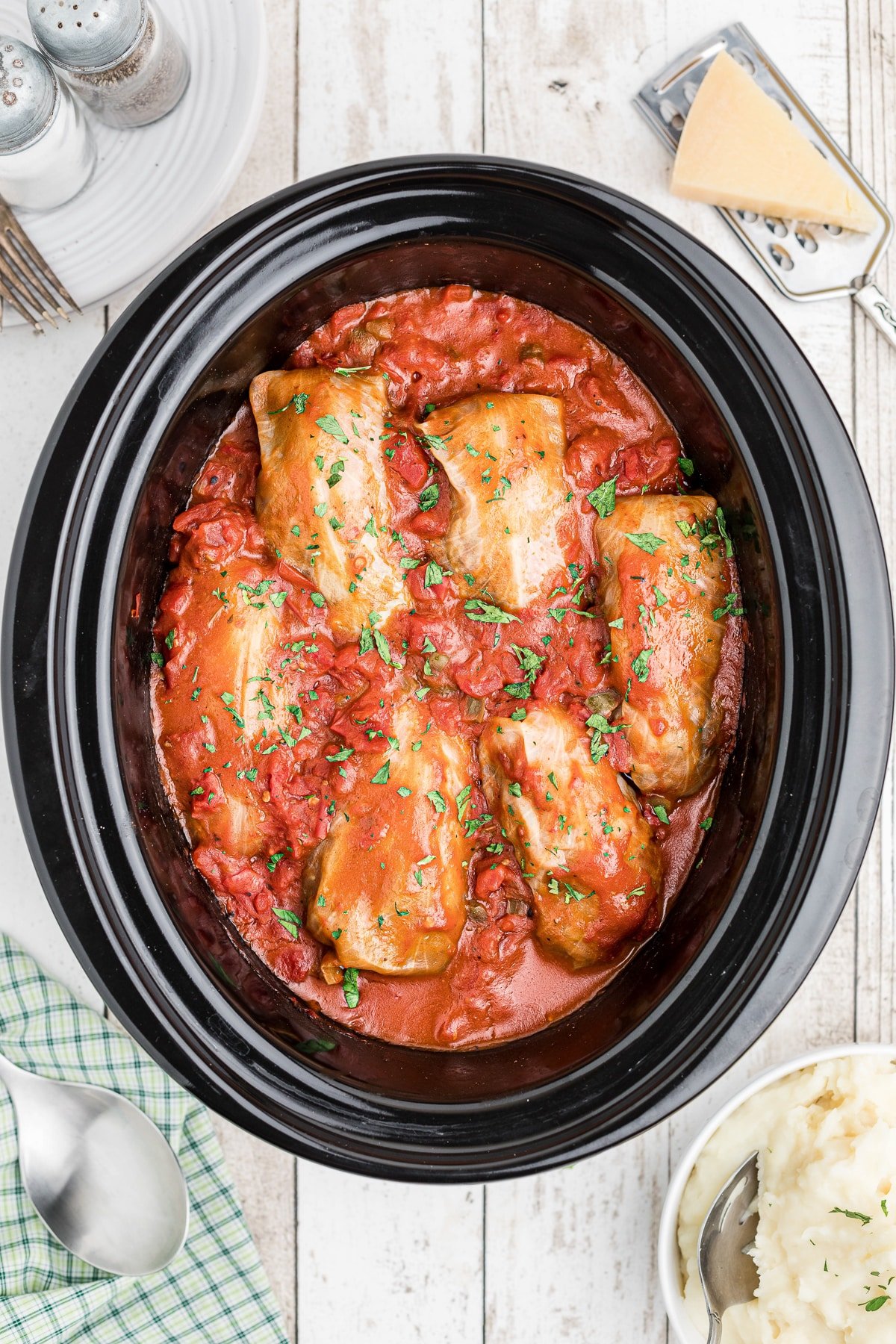 Cooked cabbage rolls in the crockpot.