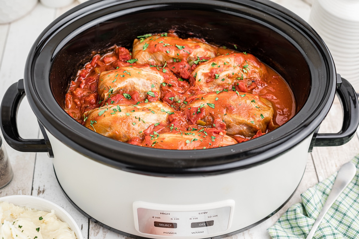 cabbage rolls done cooking in a crockpot.