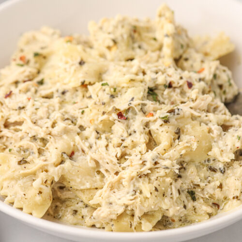 bowl of creamy pesto chicken pasta.