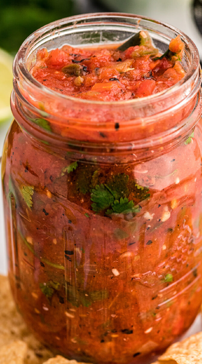 long image of salsa in a jar.