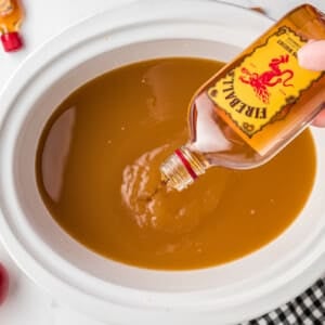 fireball being pour into cider.