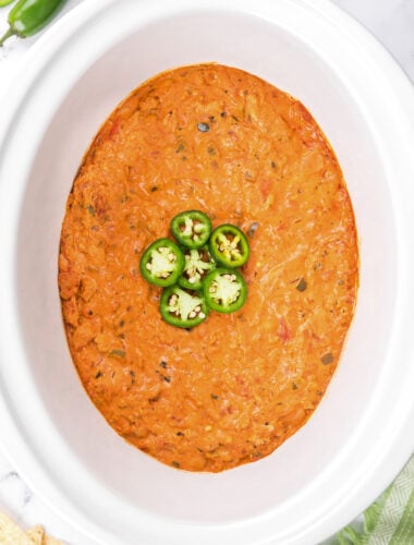 Overhead shot of jalapeno popper chili in crockpot.