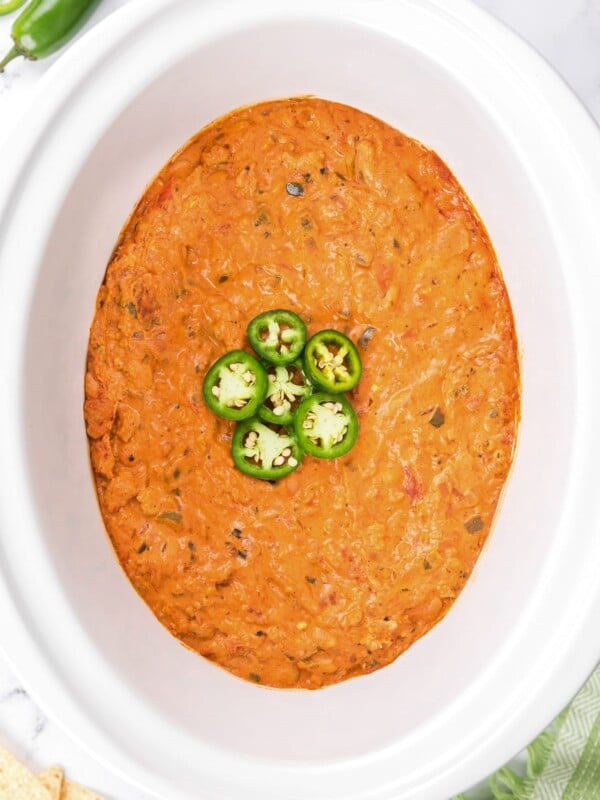 Overhead shot of jalapeno popper chili in crockpot.