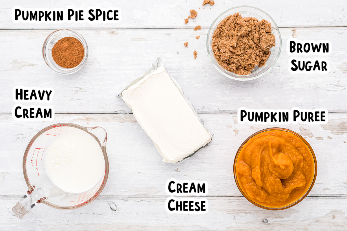Ingredients for pumpkin pie dip on a table.