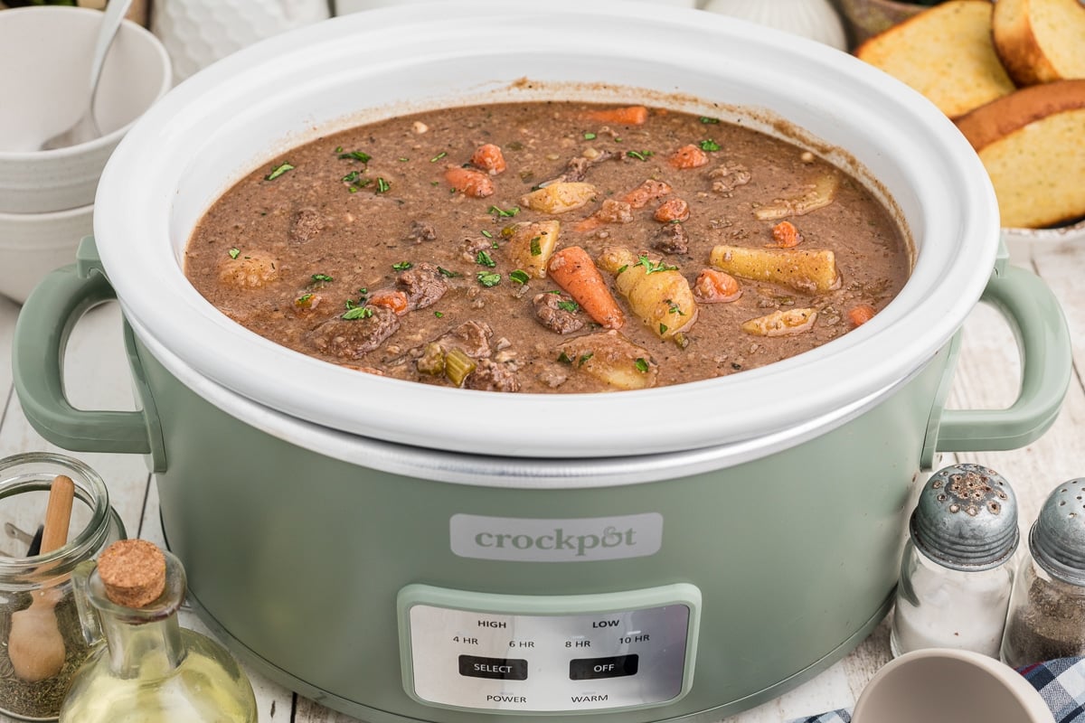 Side view of venison stew in a crock pot.