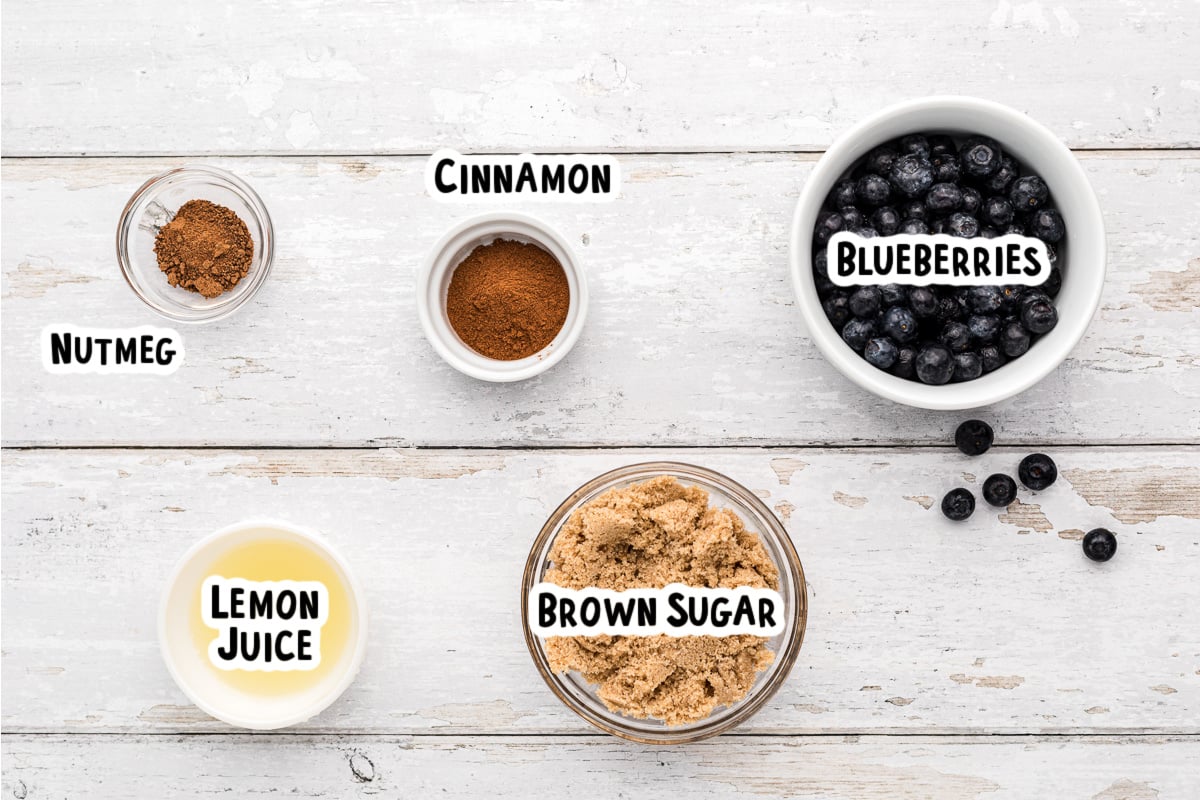 Ingredients for blueberry butter on a table.