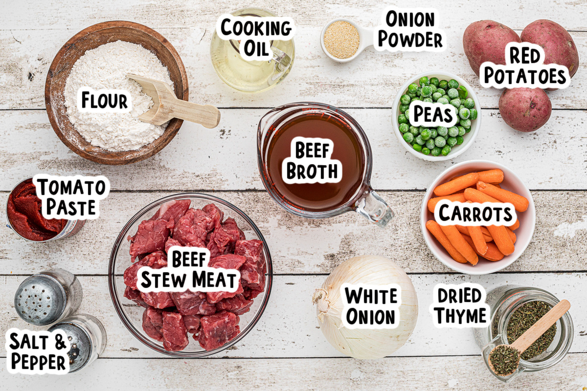 ingredients for beef stew on a table.