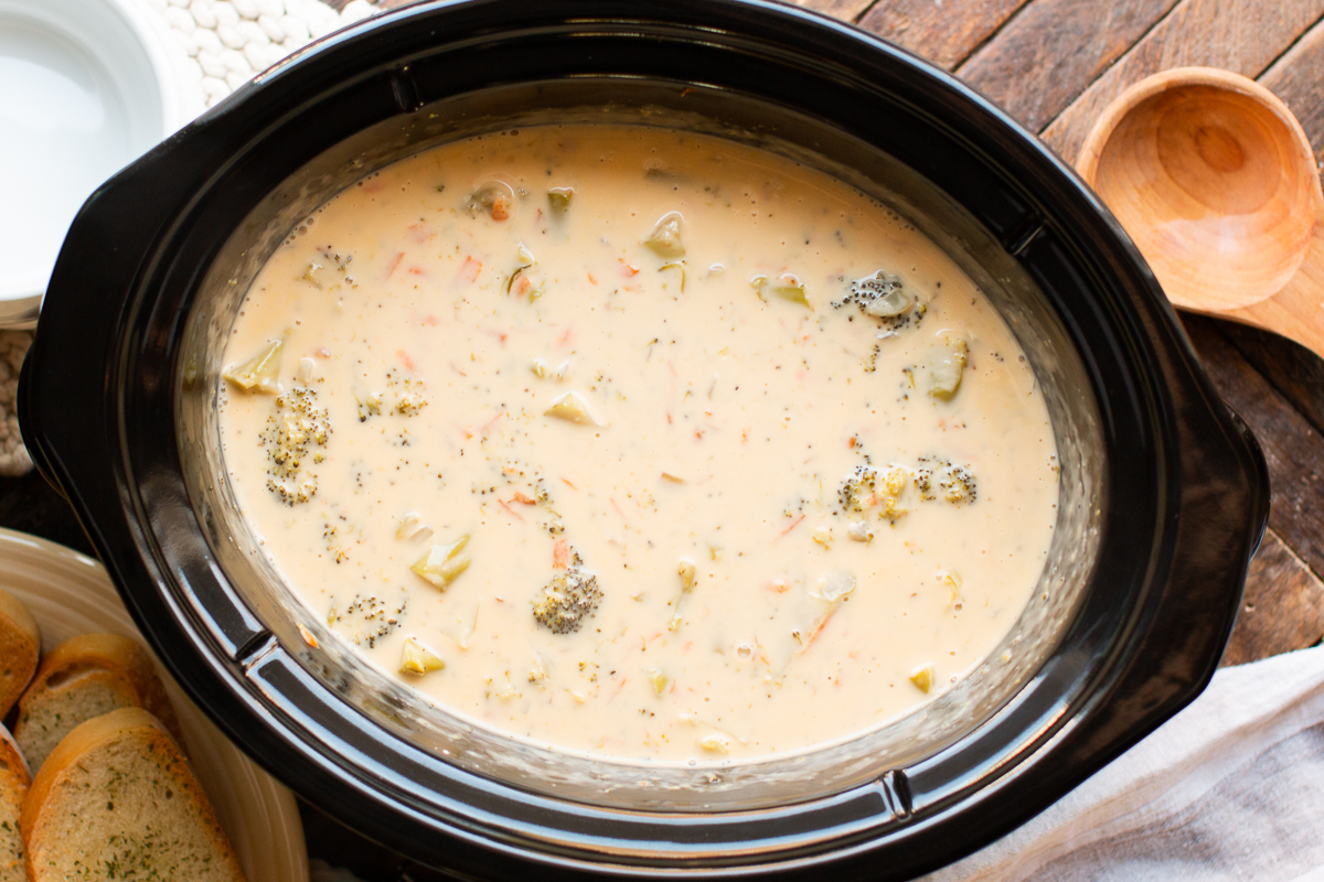 cooked brococli cheese soup in a slow cooker.