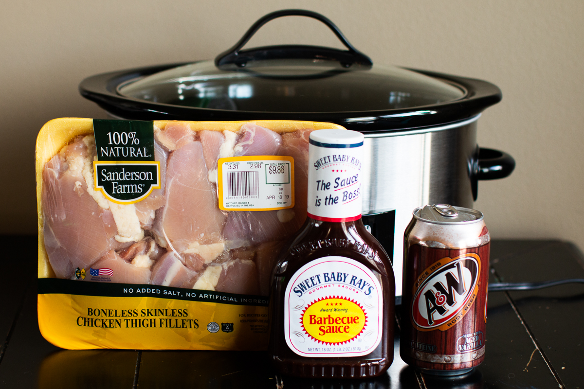 Ingredients for root beer chicken in front of a crockpot.