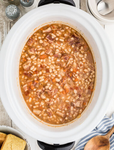 full pot of bean and bacon soup.