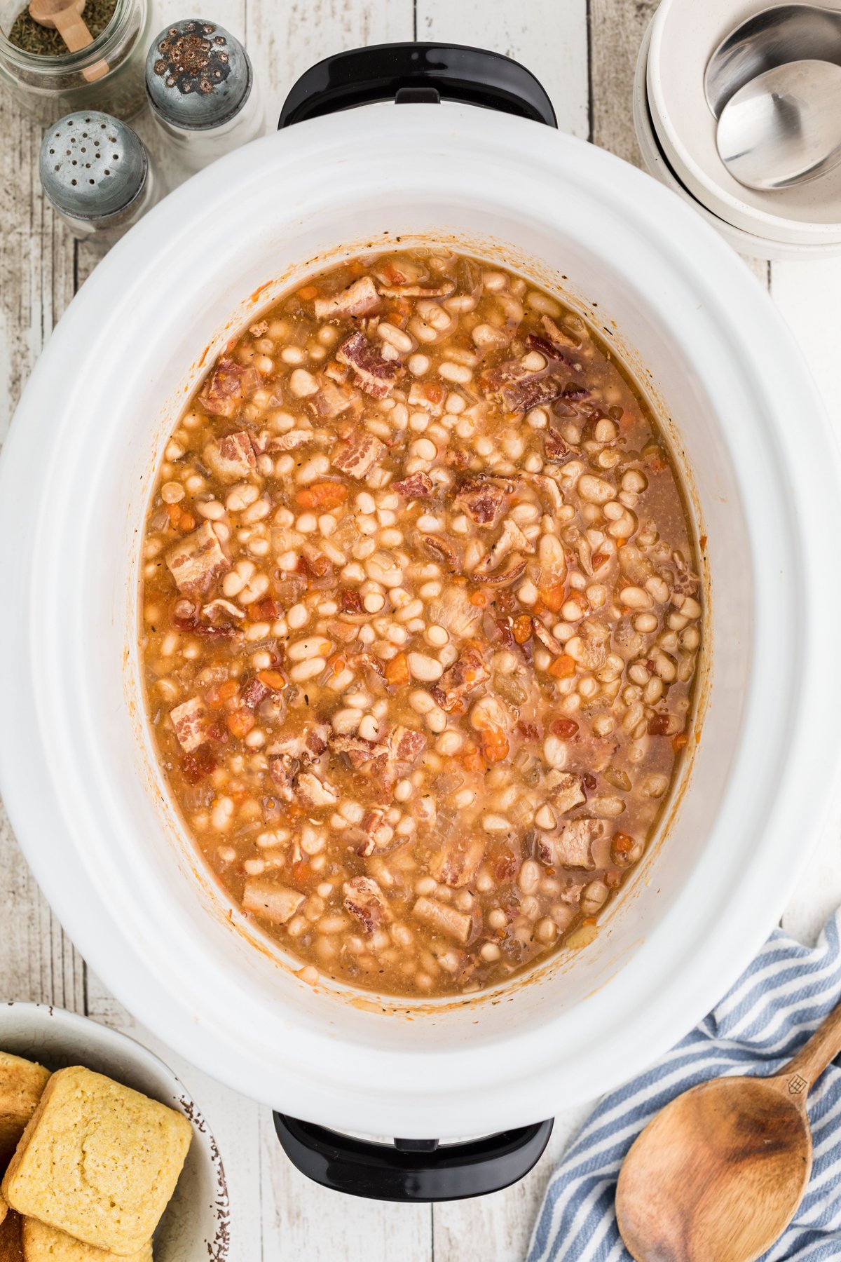 full pot of bean and bacon soup.