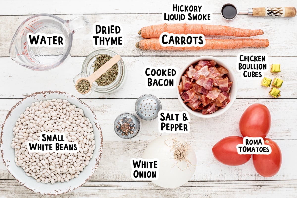 Ingredients for bean and bacon soup on a table.