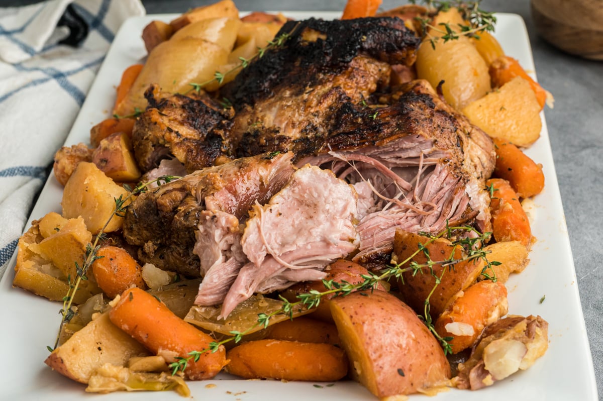 platter of crockpot pork roast with vegetables.