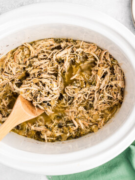 cooked and shredded salsa verde chicken.