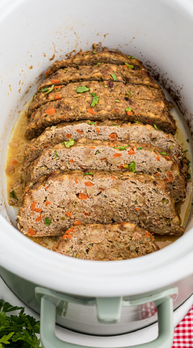 Long image of sliced turkey meatloaf for pinterest.