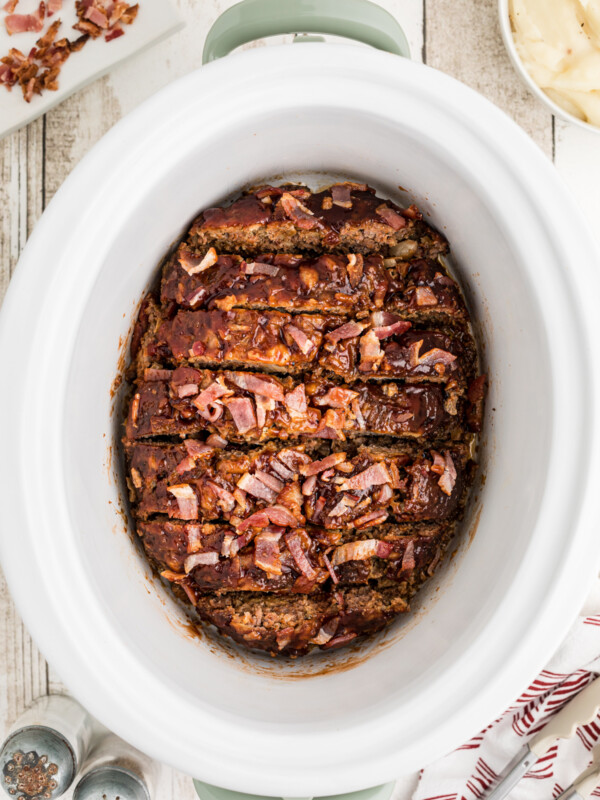 sliced meatloaf in a slow cooker.