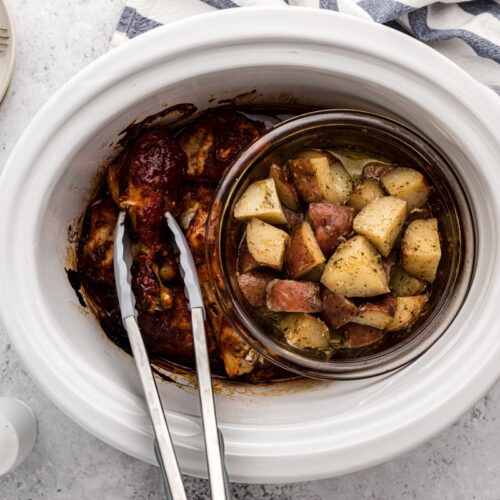 cooked chicken drumsticks with ranch potatoes.