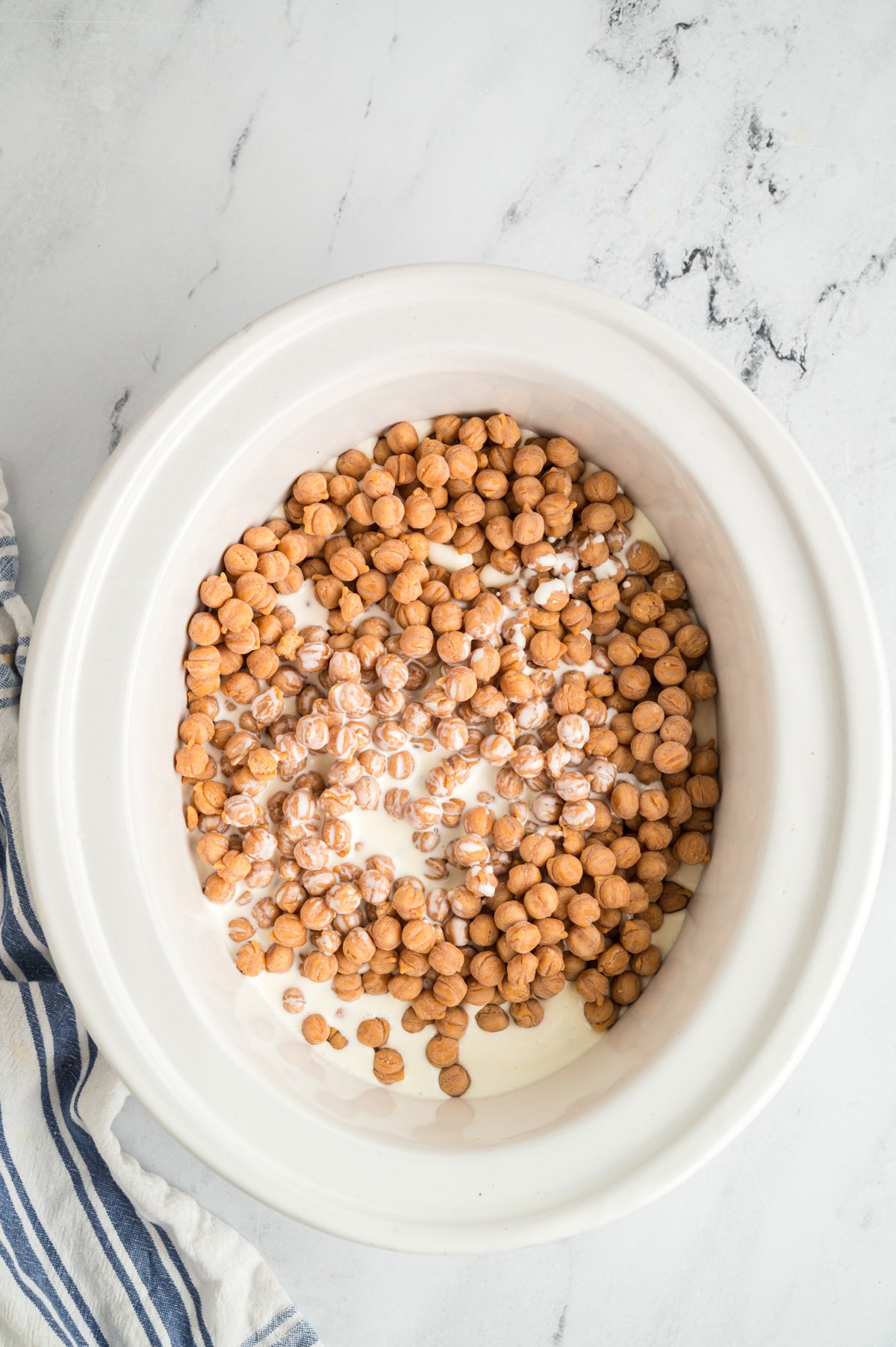 caramel bits and heavy cream in a slow cooker.