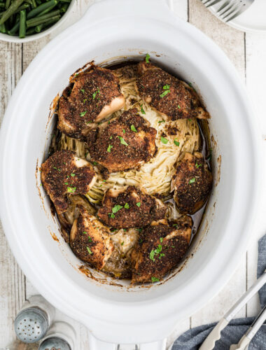 Chicken and cabbage cooked in a crockpot.