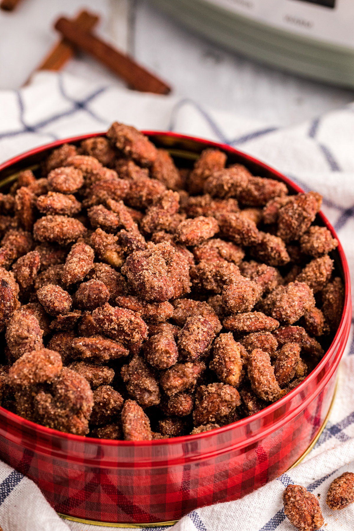 close up of crunchy cinnamon almonds in the slow cooker.