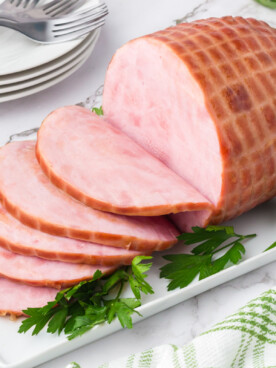 sliced ham on a platter.