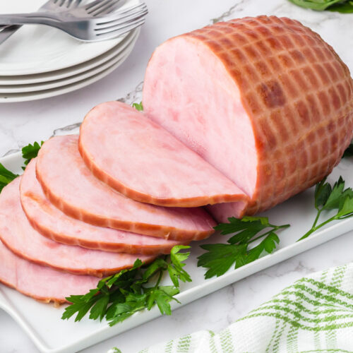 sliced ham on a platter.