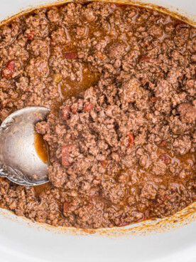 overhead shot of venison taco meat with a spoon in it.