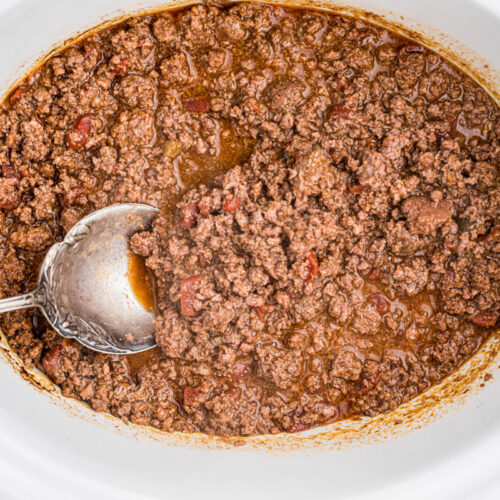 overhead shot of venison taco meat with a spoon in it.