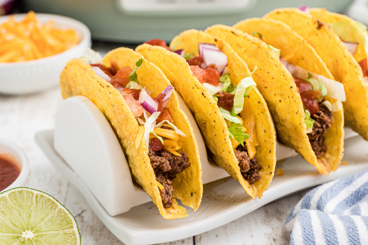 close up of venison tacos on a stand.