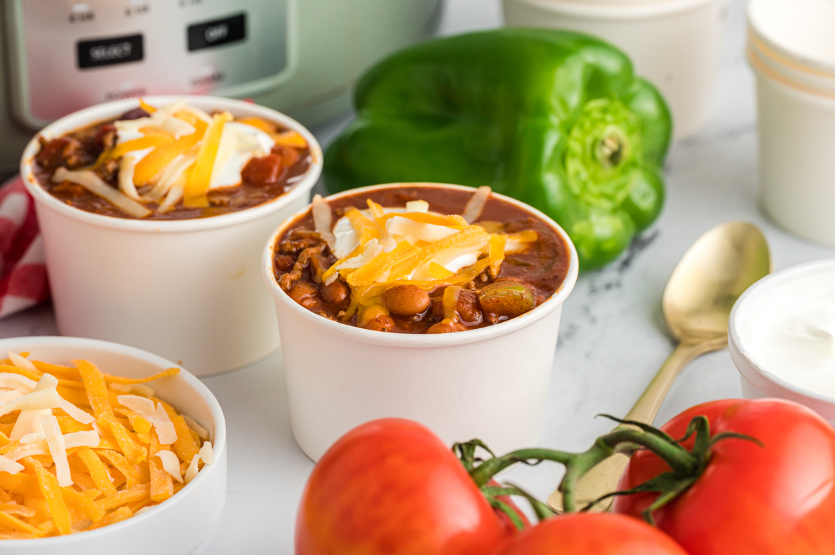 chili in white paper cups.