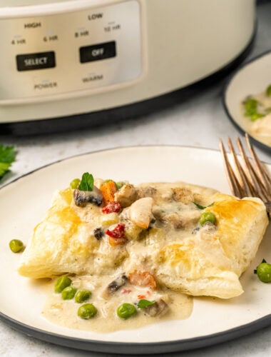 puff pastry with chicken ala king sauce in front of a slow cooker.