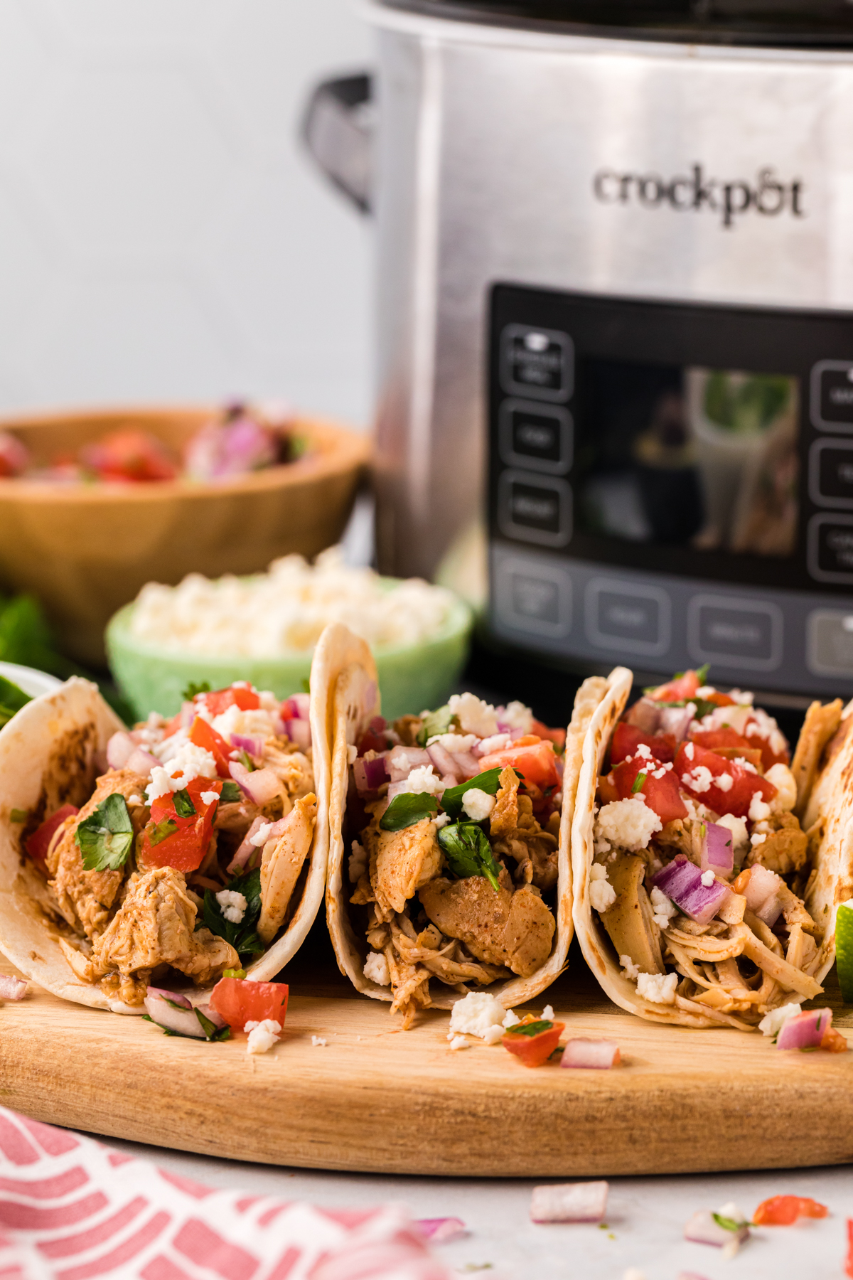 Cool ranch tacos in front of a slow cooker.