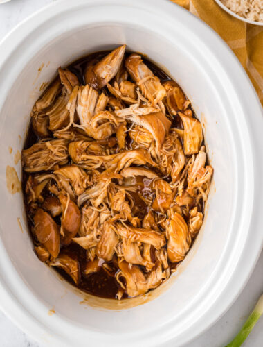 shredded chicken in the slow cooker with homemade teriyaki sauce.