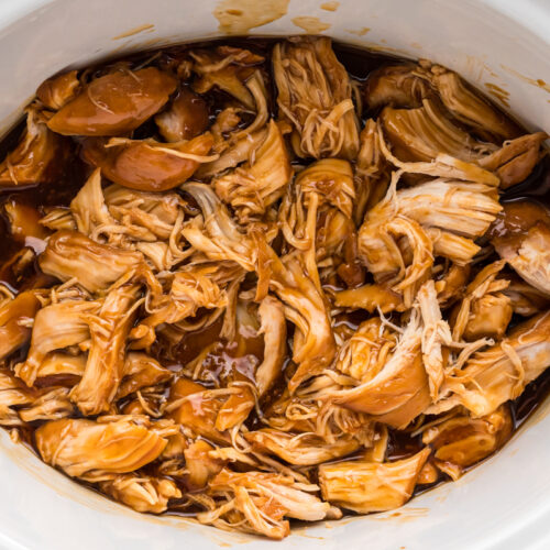 Overhead shot of teriyaki chicken in a slow cooker.