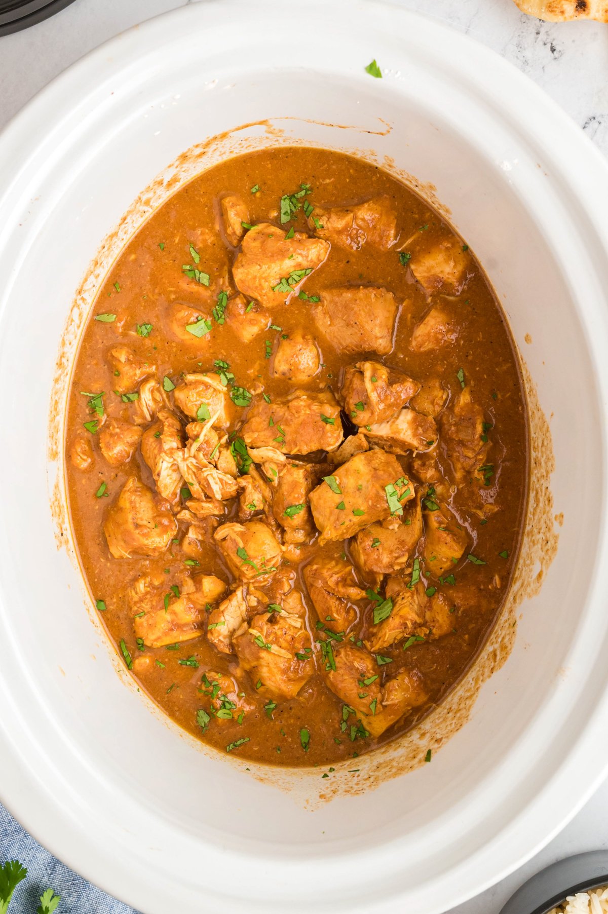 Butter chicken cooked in a crockpot.