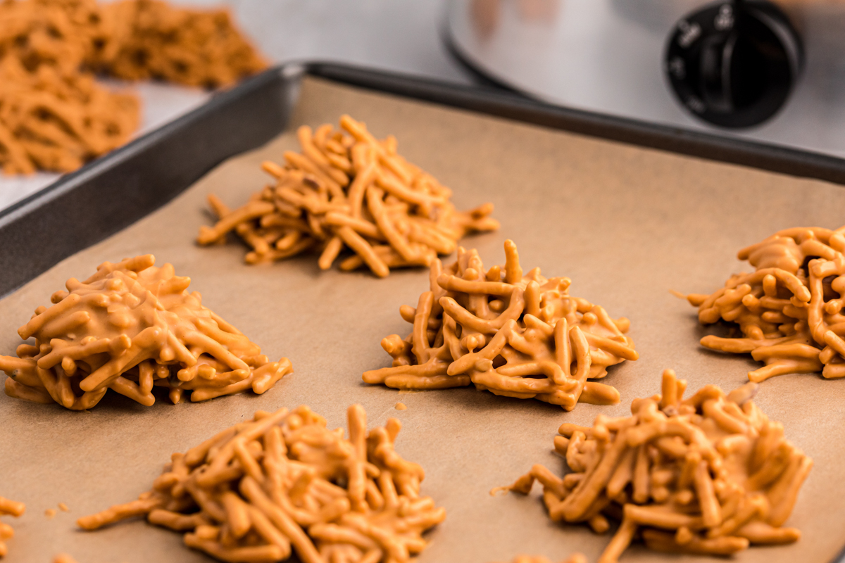 Sheet tray with cooling butterscotch haystacks on it.