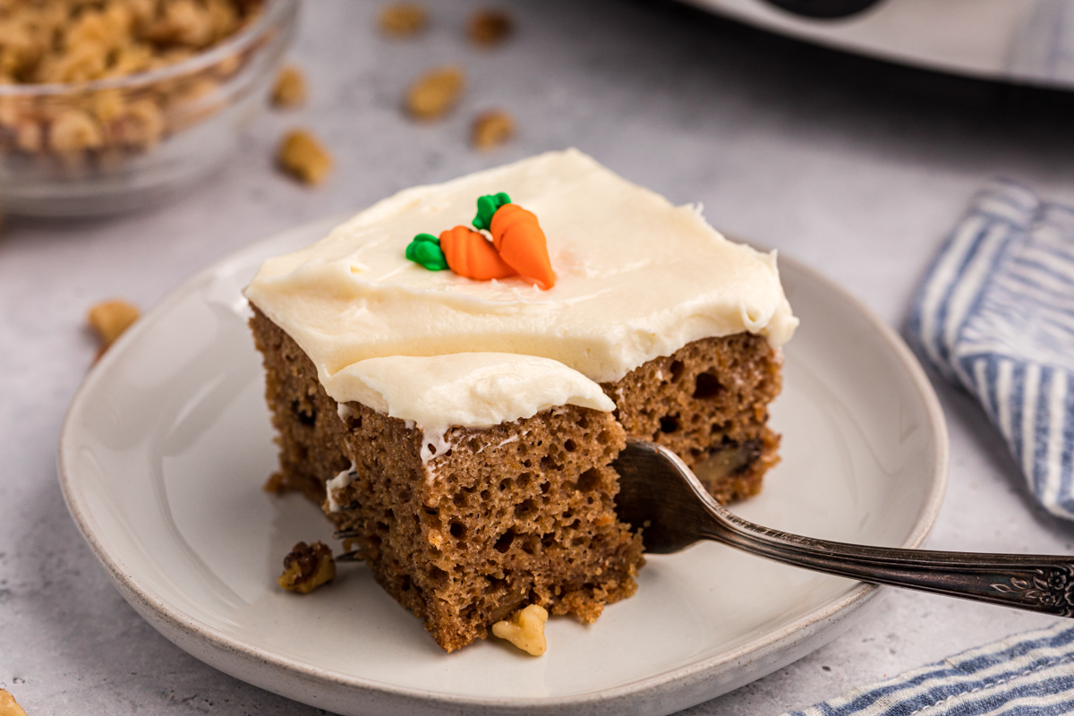 carrot cake with fork in it.