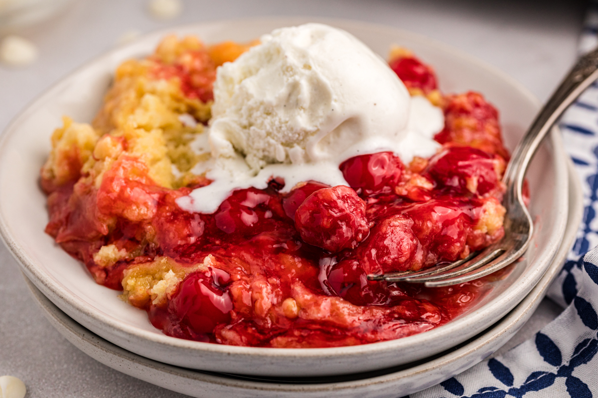 cherry dump cake on a plate.