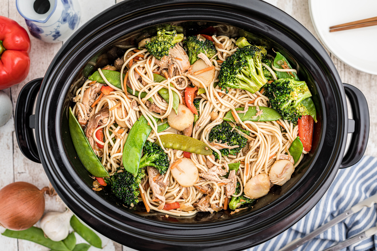 Overhead shot of chicken chow mein in a slow cooker.