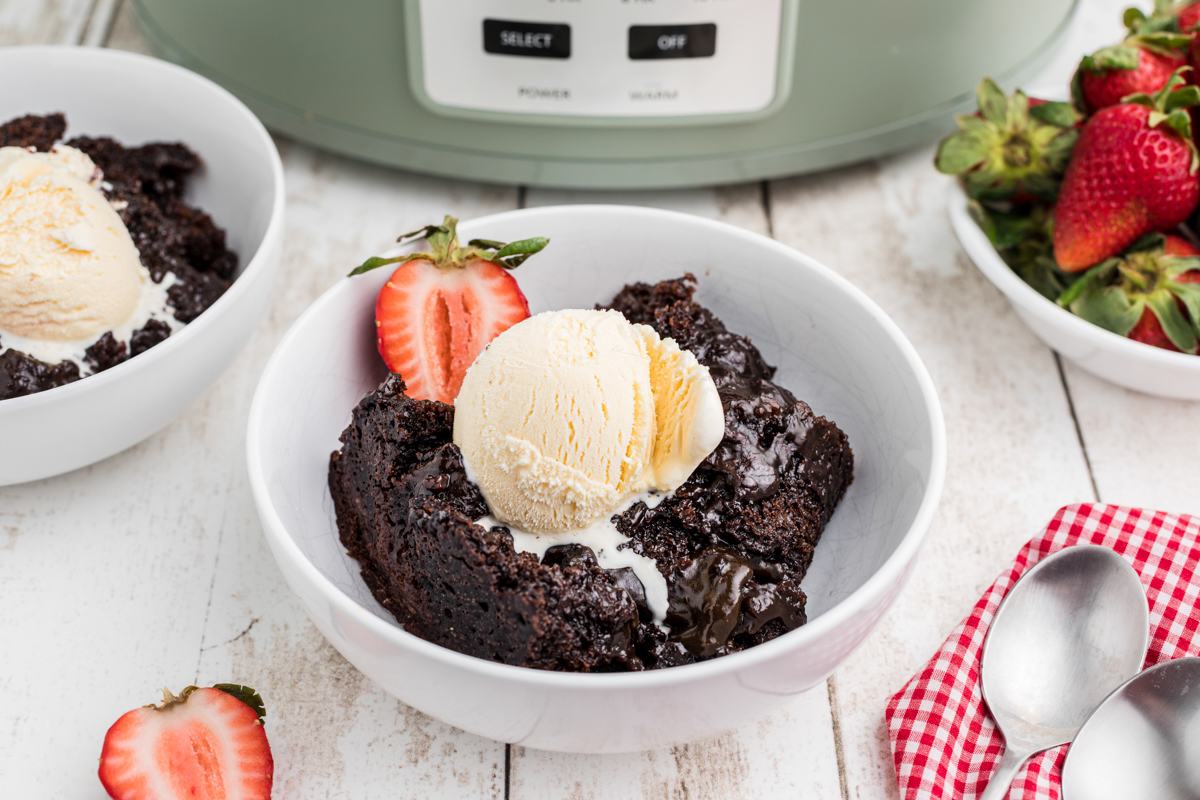 bowl of lava cake with vanilla ice cream.